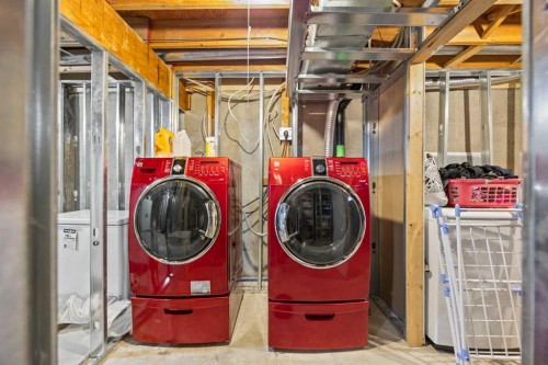 502 Signal Hill Green Sw, Calgary, AB - Indoor Photo Showing Laundry Room