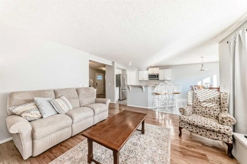 344 Copperfield Boulevard Se, Calgary, AB - Indoor Photo Showing Living Room