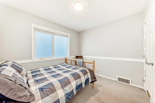 344 Copperfield Boulevard Se, Calgary, AB - Indoor Photo Showing Bedroom