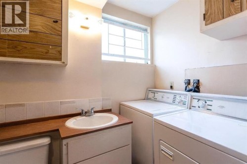 7803 Hunterslea Crescent Nw, Calgary, AB - Indoor Photo Showing Laundry Room