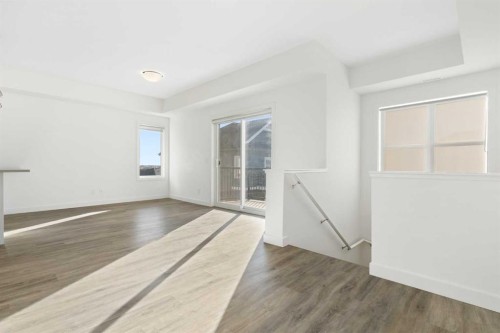 605-24 Rivercrest Drive, Cochrane, AB - Indoor Photo Showing Other Room
