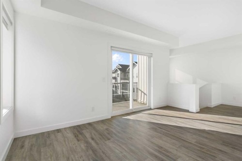 605-24 Rivercrest Drive, Cochrane, AB - Indoor Photo Showing Other Room