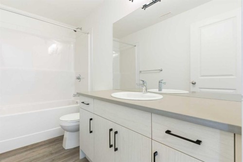 605-24 Rivercrest Drive, Cochrane, AB - Indoor Photo Showing Bathroom