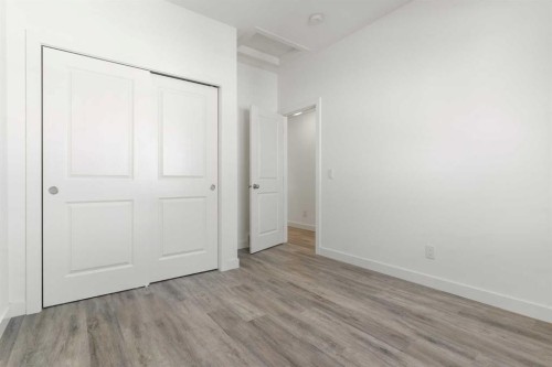 605-24 Rivercrest Drive, Cochrane, AB - Indoor Photo Showing Other Room