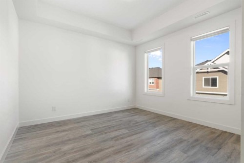 605-24 Rivercrest Drive, Cochrane, AB - Indoor Photo Showing Other Room