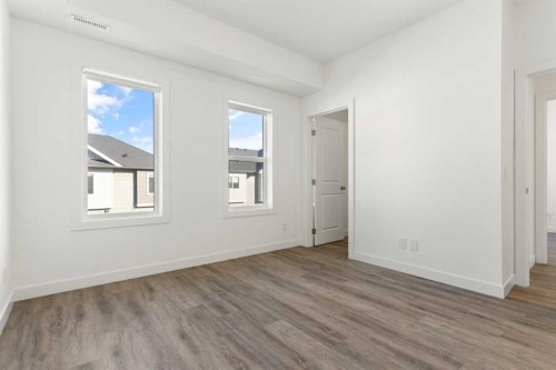 605-24 Rivercrest Drive, Cochrane, AB - Indoor Photo Showing Other Room