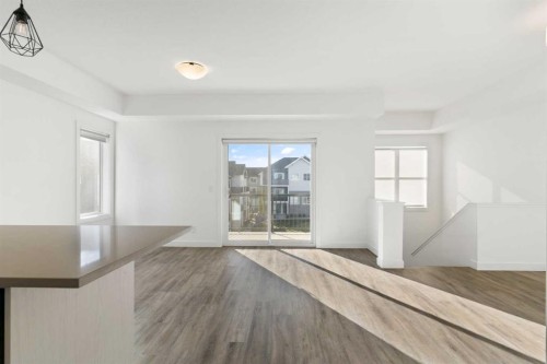 605-24 Rivercrest Drive, Cochrane, AB - Indoor Photo Showing Other Room