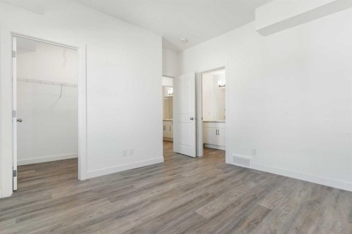 605-24 Rivercrest Drive, Cochrane, AB - Indoor Photo Showing Other Room