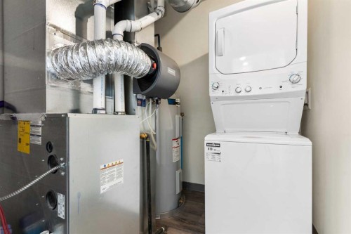 605-24 Rivercrest Drive, Cochrane, AB - Indoor Photo Showing Laundry Room