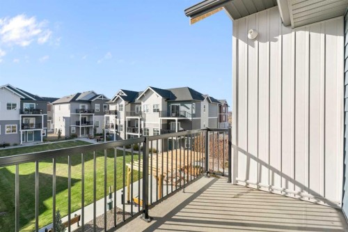 605-24 Rivercrest Drive, Cochrane, AB - Outdoor With Exterior