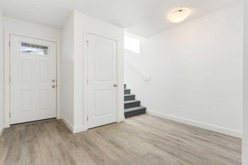 605-24 Rivercrest Drive, Cochrane, AB - Indoor Photo Showing Other Room