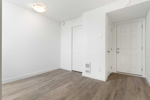 605-24 Rivercrest Drive, Cochrane, AB - Indoor Photo Showing Other Room