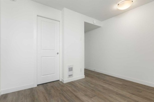 605-24 Rivercrest Drive, Cochrane, AB - Indoor Photo Showing Other Room