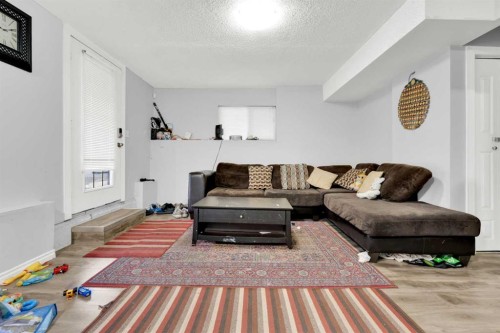 185 Tarawood Place Ne, Calgary, AB - Indoor Photo Showing Living Room