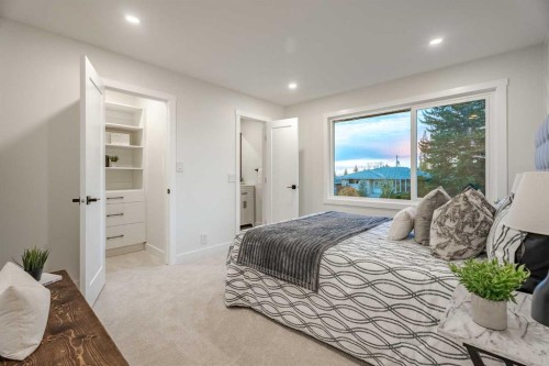 1024 Hunterston Place Nw, Calgary, AB - Indoor Photo Showing Bedroom