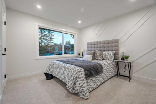 1024 Hunterston Place Nw, Calgary, AB - Indoor Photo Showing Bedroom