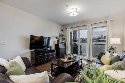 308-1899 45 Street Nw, Calgary, AB - Indoor Photo Showing Living Room