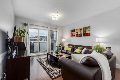308-1899 45 Street Nw, Calgary, AB - Indoor Photo Showing Living Room