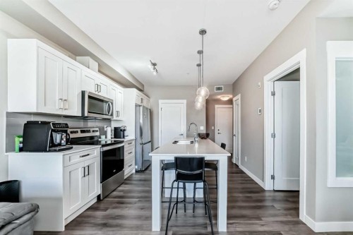 207-40 Walgrove Walk Se, Calgary, AB - Indoor Photo Showing Kitchen With Stainless Steel Kitchen With Upgraded Kitchen