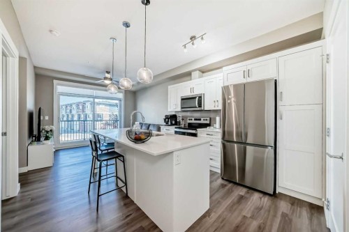 207-40 Walgrove Walk Se, Calgary, AB - Indoor Photo Showing Kitchen With Stainless Steel Kitchen With Upgraded Kitchen