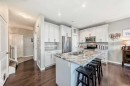 4 Bethune Way, Carstairs, AB  - Indoor Photo Showing Kitchen With Double Sink With Upgraded Kitchen 