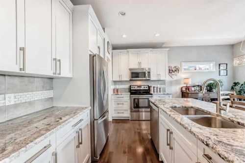 4 Bethune Way, Carstairs, AB - Indoor Photo Showing Kitchen With Double Sink With Upgraded Kitchen