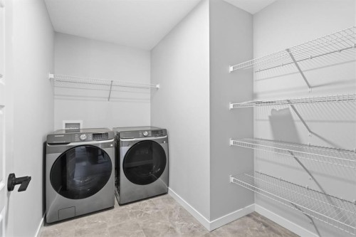 132 Lewiston Drive Ne, Calgary, AB - Indoor Photo Showing Laundry Room