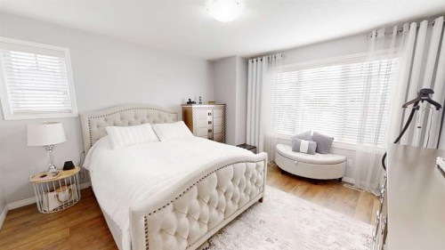 103 Prestwick Villas Se, Calgary, AB - Indoor Photo Showing Bedroom