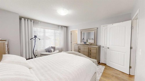 103 Prestwick Villas Se, Calgary, AB - Indoor Photo Showing Bedroom