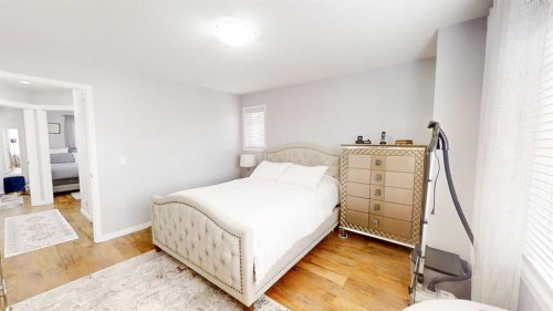 103 Prestwick Villas Se, Calgary, AB - Indoor Photo Showing Bedroom