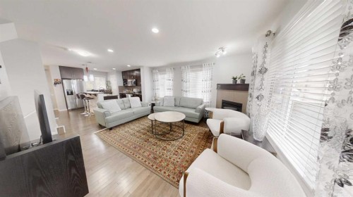 103 Prestwick Villas Se, Calgary, AB - Indoor Photo Showing Living Room