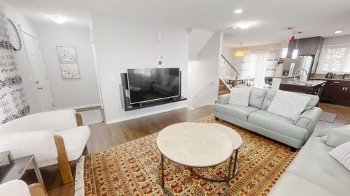103 Prestwick Villas Se, Calgary, AB - Indoor Photo Showing Living Room