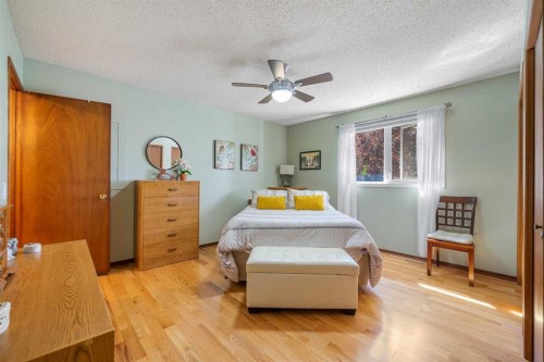 7 Bernard Court Nw, Calgary, AB - Indoor Photo Showing Bedroom