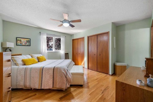 7 Bernard Court Nw, Calgary, AB - Indoor Photo Showing Bedroom