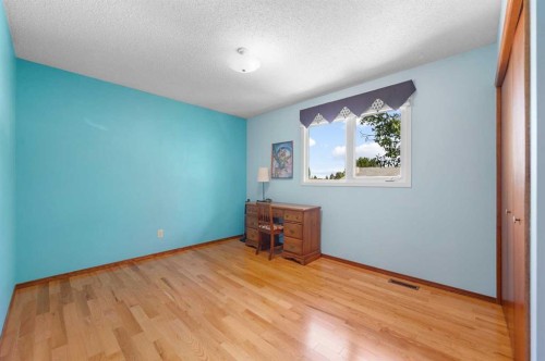 7 Bernard Court Nw, Calgary, AB - Indoor Photo Showing Other Room