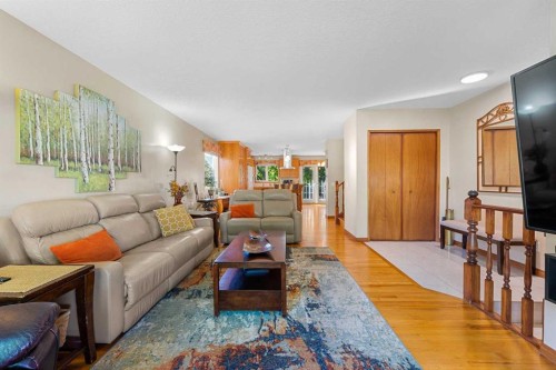 7 Bernard Court Nw, Calgary, AB - Indoor Photo Showing Living Room