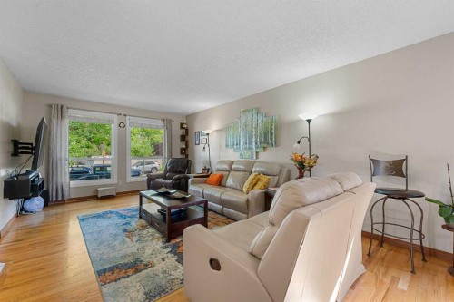 7 Bernard Court Nw, Calgary, AB - Indoor Photo Showing Living Room