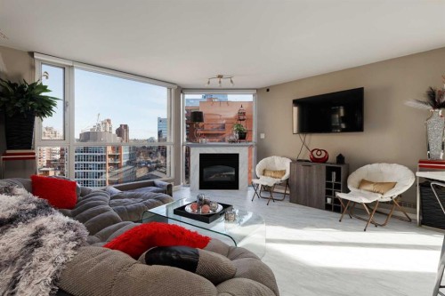 1303-804 3 Avenue Sw, Calgary, AB - Indoor Photo Showing Living Room With Fireplace