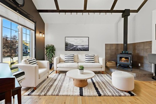 39 Valarosa Drive, Didsbury, AB - Indoor Photo Showing Living Room With Fireplace