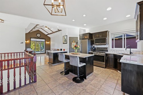 39 Valarosa Drive, Didsbury, AB - Indoor Photo Showing Kitchen With Upgraded Kitchen