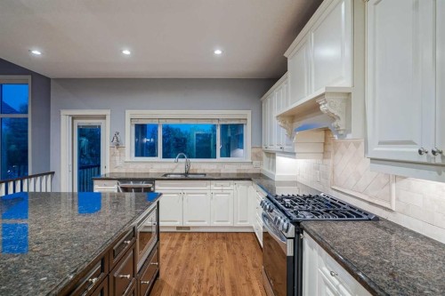 231 Railway Close Se, Langdon, AB - Indoor Photo Showing Kitchen With Upgraded Kitchen