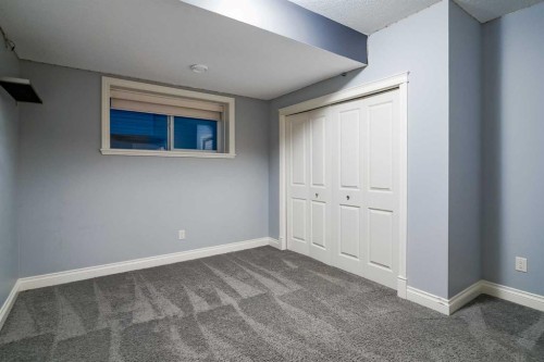 231 Railway Close Se, Langdon, AB - Indoor Photo Showing Other Room