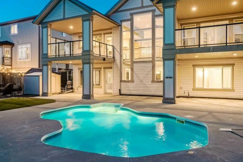 231 Railway Close Se, Langdon, AB - Outdoor With In Ground Pool