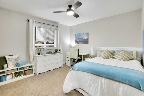 142 Luxstone View Sw, Airdrie, AB - Indoor Photo Showing Bedroom