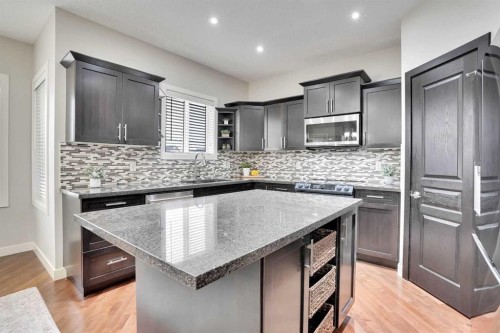 142 Luxstone View Sw, Airdrie, AB - Indoor Photo Showing Kitchen With Upgraded Kitchen
