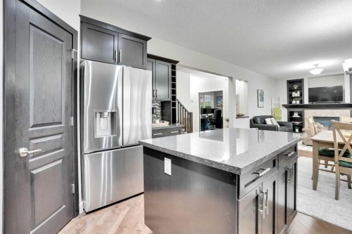 142 Luxstone View Sw, Airdrie, AB - Indoor Photo Showing Kitchen With Stainless Steel Kitchen With Upgraded Kitchen
