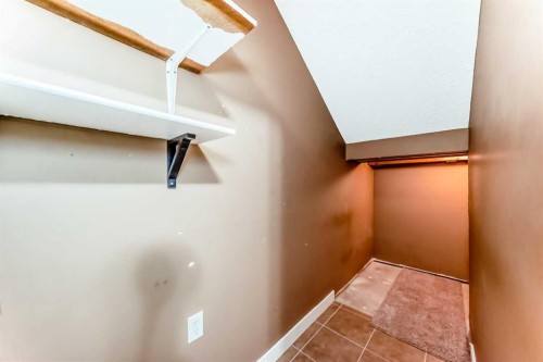 418 Covecreek Circle Ne, Calgary, AB - Indoor Photo Showing Other Room