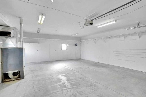 56 Castleglen Crescent Ne, Calgary, AB - Indoor Photo Showing Garage