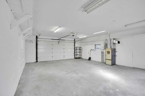 56 Castleglen Crescent Ne, Calgary, AB - Indoor Photo Showing Garage