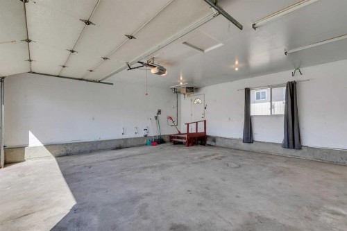 2823 Dover Ridge Drive Se, Calgary, AB - Indoor Photo Showing Garage